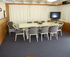The dining table comfortably accommodates a full crew of 12